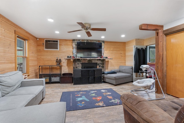 20425 N Hazelcrest Rd, Palatine, IL 60074 - living area featuring wood walls, a ceiling fan, an AC wall unit, recessed lighting, and a fireplace