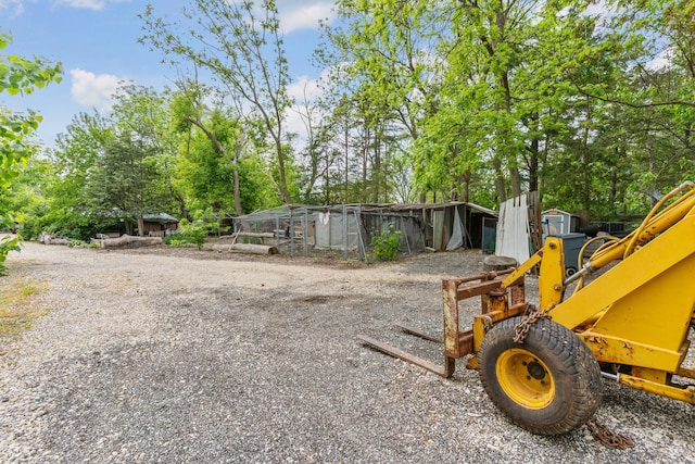 20425 N Hazelcrest Rd, Palatine, IL 60074 - view of yard with an outbuilding and view of wooded area