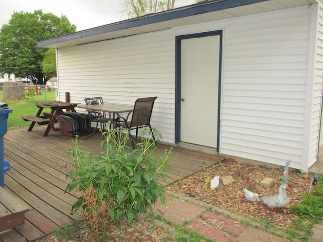 411 S Walnut St, Forreston, IL 61030 - wooden deck featuring outdoor dining area
