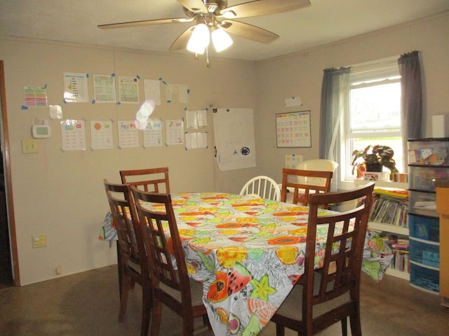 411 S Walnut St, Forreston, IL 61030 - carpeted dining room with ceiling fan