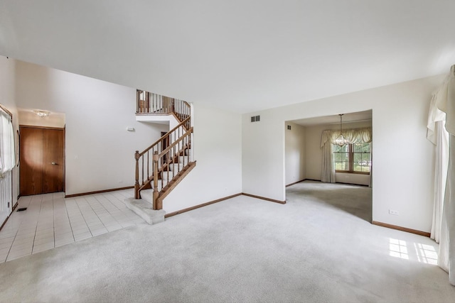 1492 Della Dr, Hoffman Estates, IL 60169 - unfurnished living room featuring a chandelier, stairs, and carpet floors