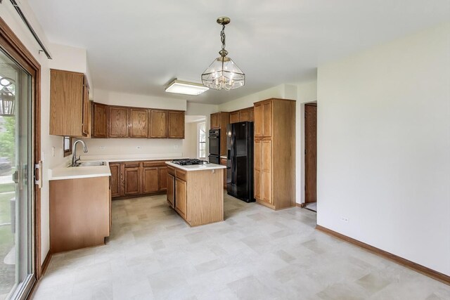 1492 Della Dr, Hoffman Estates, IL 60169 - kitchen featuring black fridge, a chandelier, light countertops, a kitchen island, and brown cabinetry