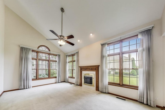 1492 Della Dr, Hoffman Estates, IL 60169 - unfurnished living room featuring light colored carpet, a ceiling fan, a tile fireplace, high vaulted ceiling, and recessed lighting