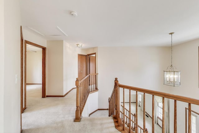 1492 Della Dr, Hoffman Estates, IL 60169 - hall with an upstairs landing, light carpet, and a chandelier