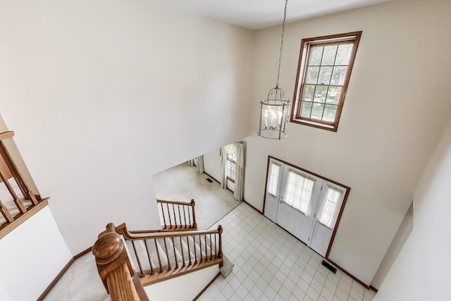 1492 Della Dr, Hoffman Estates, IL 60169 - stairs with a chandelier and carpet