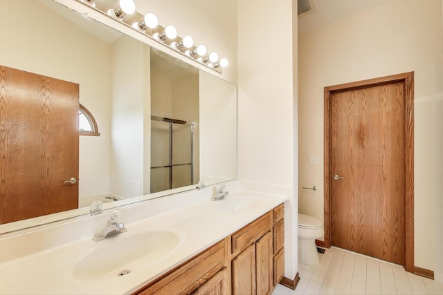 1492 Della Dr, Hoffman Estates, IL 60169 - bathroom featuring double vanity, an enclosed shower, and tile patterned floors