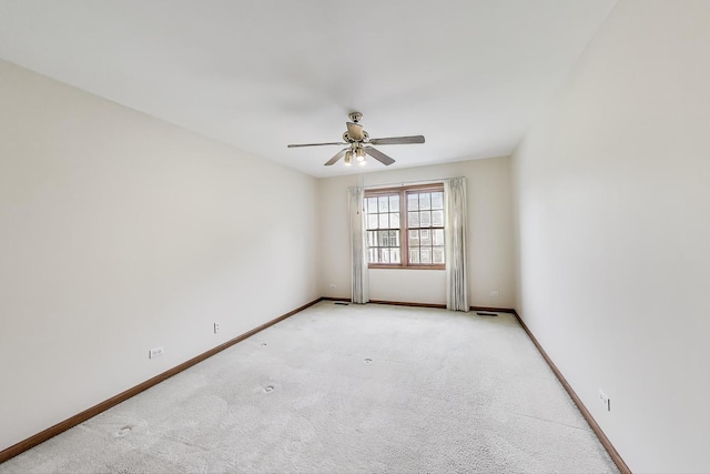 1492 Della Dr, Hoffman Estates, IL 60169 - empty room featuring a ceiling fan and light colored carpet
