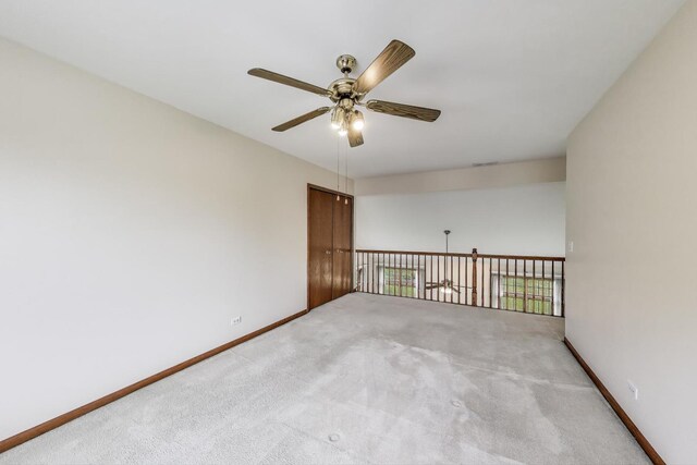 1492 Della Dr, Hoffman Estates, IL 60169 - unfurnished room featuring a ceiling fan and light colored carpet