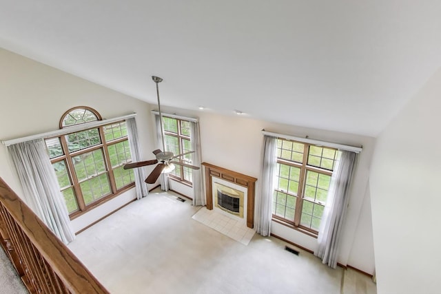 1492 Della Dr, Hoffman Estates, IL 60169 - unfurnished living room featuring vaulted ceiling, light carpet, a fireplace, and ceiling fan