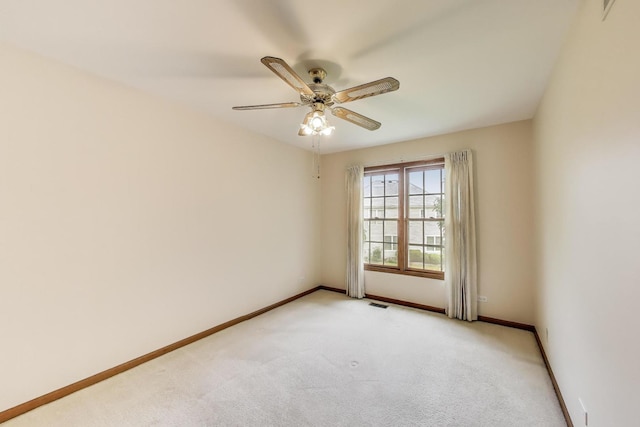 1492 Della Dr, Hoffman Estates, IL 60169 - spare room with light carpet and ceiling fan