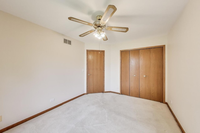 1492 Della Dr, Hoffman Estates, IL 60169 - unfurnished bedroom featuring carpet floors, a closet, and ceiling fan