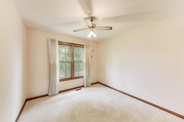 1492 Della Dr, Hoffman Estates, IL 60169 - empty room with a ceiling fan and light carpet