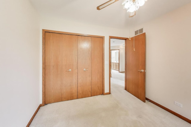 1492 Della Dr, Hoffman Estates, IL 60169 - unfurnished bedroom with carpet floors, a closet, and a ceiling fan