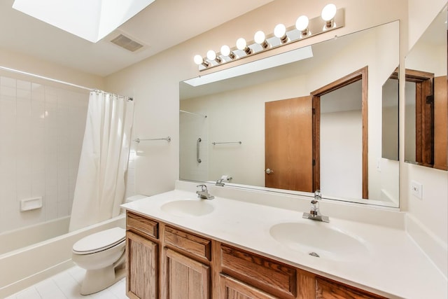 1492 Della Dr, Hoffman Estates, IL 60169 - bathroom with double vanity, shower / bathtub combination with curtain, tile patterned flooring, and a skylight