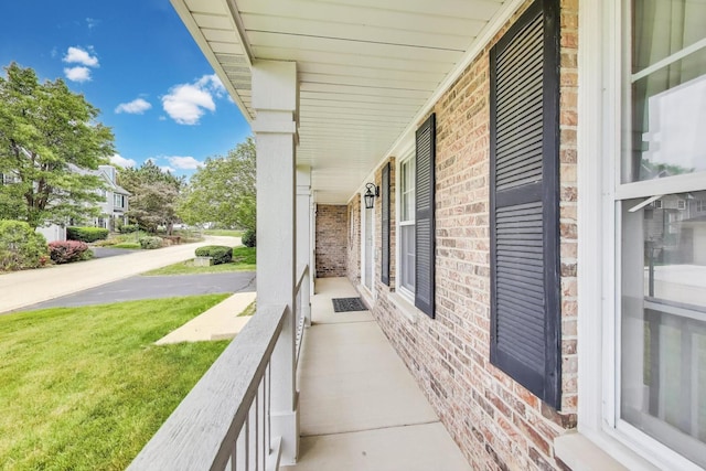 1492 Della Dr, Hoffman Estates, IL 60169 - porch featuring a lawn