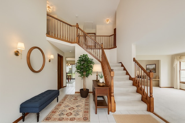 1492 Della Dr, Hoffman Estates, IL 60169 - stairway with tile patterned flooring and a high ceiling