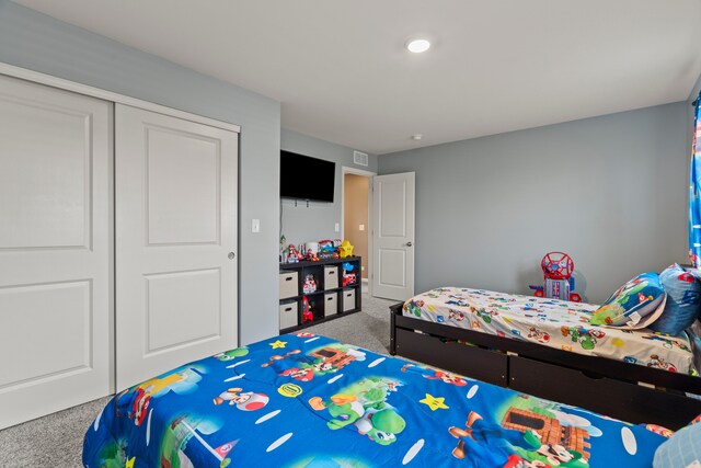 6012 Winterhaven Dr, Joliet, IL 60431 - carpeted bedroom with a closet