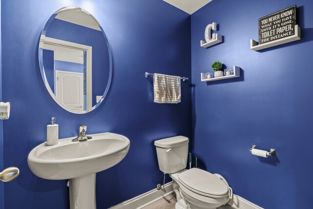 6012 Winterhaven Dr, Joliet, IL 60431 - half bath with baseboards and toilet