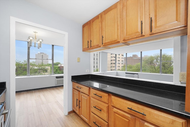5757 N Sheridan Rd Unit 5J, Chicago, IL 60660 - kitchen featuring healthy amount of natural light, a chandelier, light wood-type flooring, and a city view