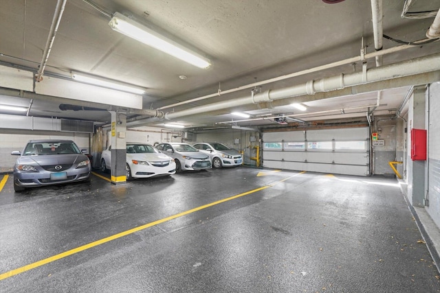 5757 N Sheridan Rd Unit 5J, Chicago, IL 60660 - parking garage featuring a garage door opener