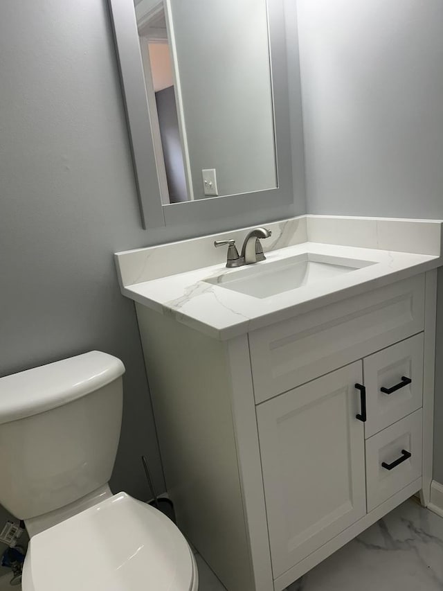 326 Dorchester Ln, Elk Grove Village, IL 60007 - bathroom featuring vanity and marble finish flooring