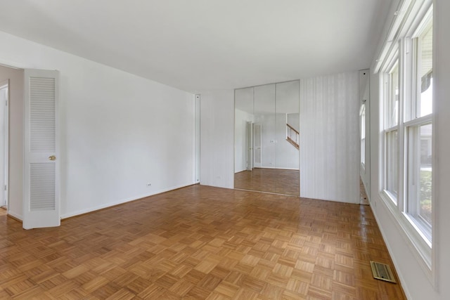 326 Dorchester Ln, Elk Grove Village, IL 60007 - spare room featuring stairs and baseboards