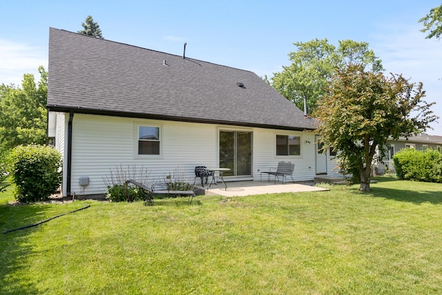 326 Dorchester Ln, Elk Grove Village, IL 60007 - back of house featuring a shingled roof, a patio, and a lawn