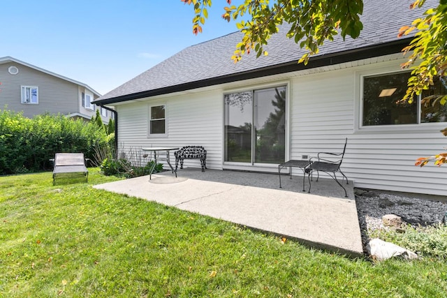 326 Dorchester Ln, Elk Grove Village, IL 60007 - back of house with a patio area, a lawn, and a shingled roof