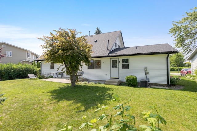 326 Dorchester Ln, Elk Grove Village, IL 60007 - back of house with a patio area, a lawn, entry steps, and a shingled roof