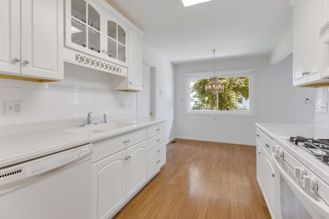 326 Dorchester Ln, Elk Grove Village, IL 60007 - kitchen featuring white appliances, light wood finished floors, decorative backsplash, white cabinets, and glass insert cabinets