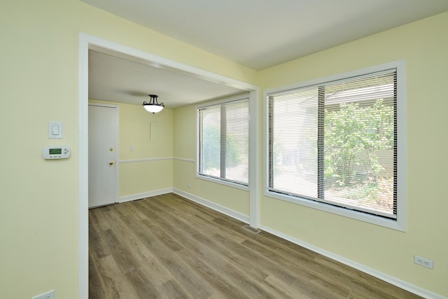 6256 Kit Carson Dr Unit 6256, Hanover Park, IL 60133 - empty room with wood finished floors and baseboards