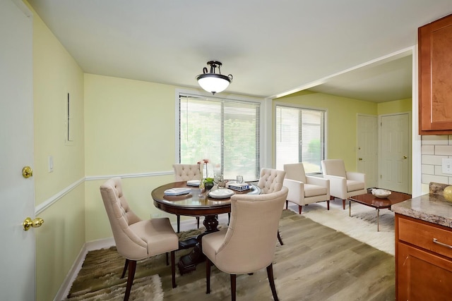 6256 Kit Carson Dr Unit 6256, Hanover Park, IL 60133 - dining space featuring light wood finished floors