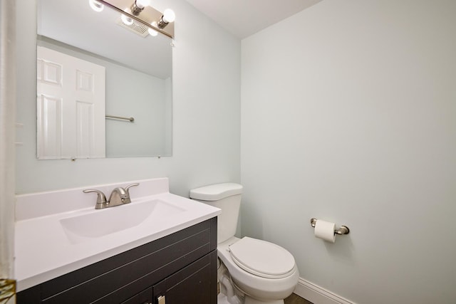 6256 Kit Carson Dr Unit 6256, Hanover Park, IL 60133 - half bathroom with toilet, vanity, and baseboards
