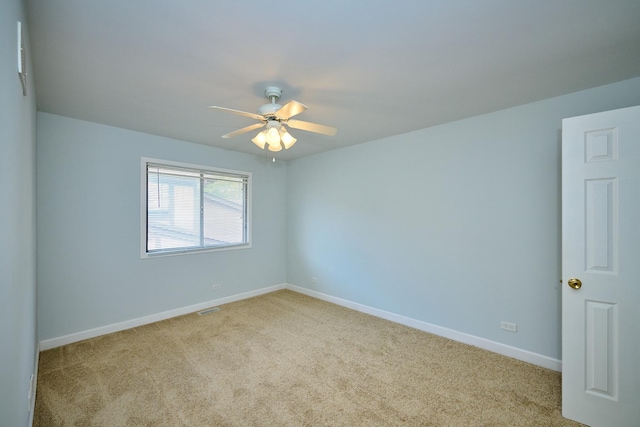 6256 Kit Carson Dr Unit 6256, Hanover Park, IL 60133 - carpeted spare room with baseboards and a ceiling fan