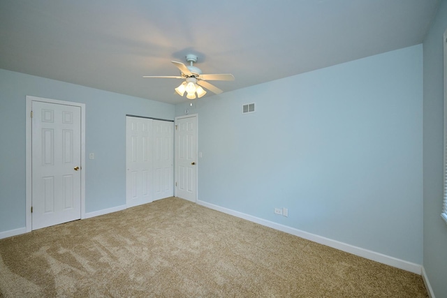 6256 Kit Carson Dr Unit 6256, Hanover Park, IL 60133 - unfurnished bedroom featuring carpet flooring, baseboards, a closet, and a ceiling fan