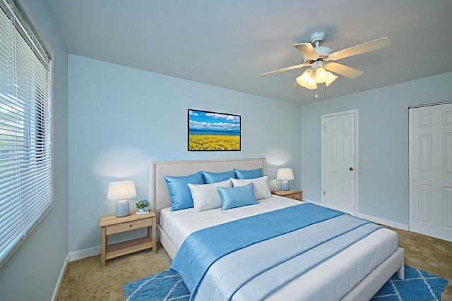 6256 Kit Carson Dr Unit 6256, Hanover Park, IL 60133 - bedroom featuring light carpet, baseboards, and ceiling fan