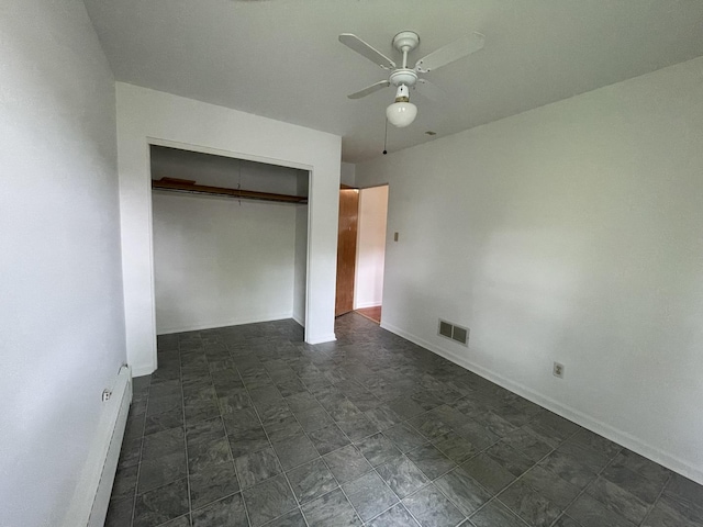 2009 Boehme St, Lockport, IL 60441 - unfurnished bedroom with a closet, baseboards, and a ceiling fan
