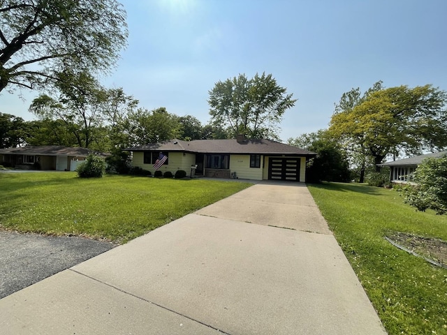 2009 Boehme St, Lockport, IL 60441 - ranch-style home featuring driveway, an attached garage, and a front yard
