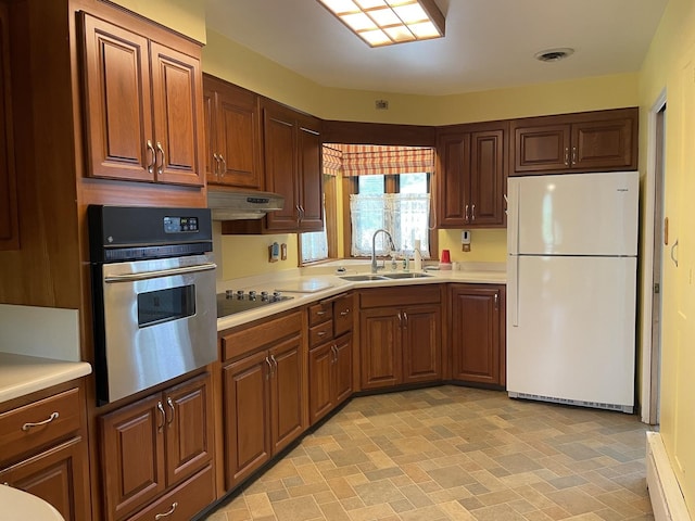 2009 Boehme St, Lockport, IL 60441 - kitchen featuring freestanding refrigerator, a sink, oven, under cabinet range hood, and light countertops