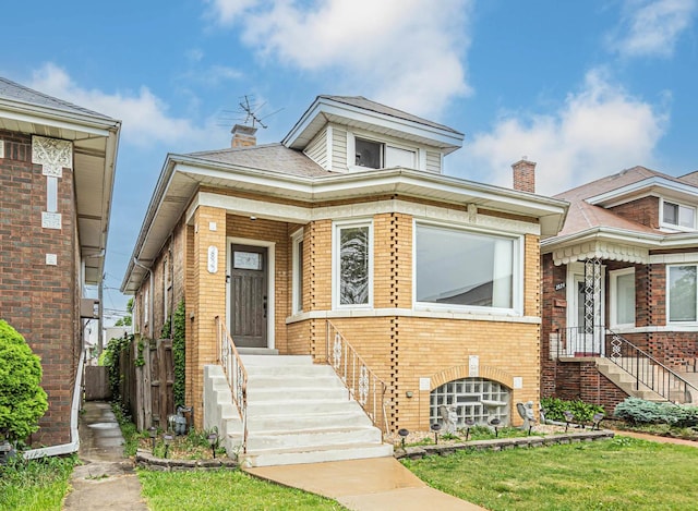 2822 N 76th Ct, Elmwood Park, IL 60707 - view of front of property with brick siding and a chimney