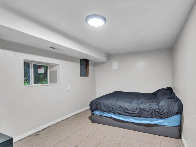 2822 N 76th Ct, Elmwood Park, IL 60707 - tiled bedroom with baseboards and electric panel