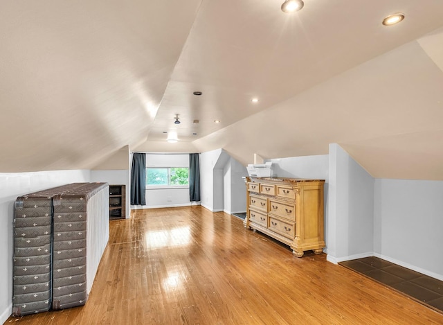 2822 N 76th Ct, Elmwood Park, IL 60707 - additional living space featuring wood-type flooring, vaulted ceiling, baseboards, and recessed lighting
