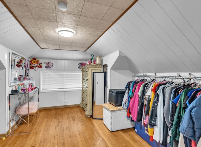2822 N 76th Ct, Elmwood Park, IL 60707 - walk in closet featuring lofted ceiling and light wood-style flooring