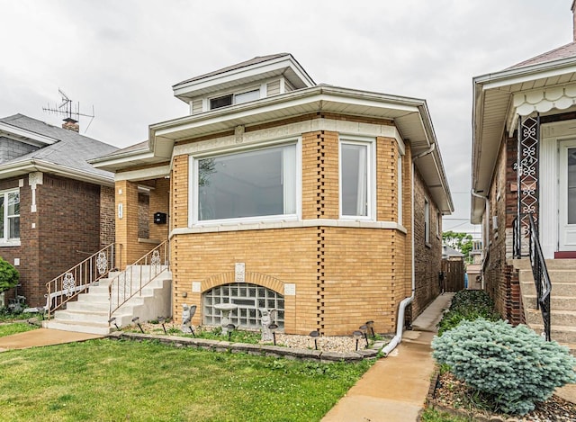 2822 N 76th Ct, Elmwood Park, IL 60707 - view of front of home featuring brick siding and a front lawn