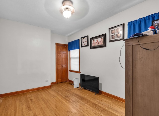 2822 N 76th Ct, Elmwood Park, IL 60707 - spare room with light wood-style floors and baseboards