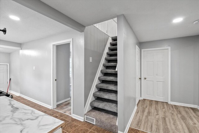 752 N 9th Ave, Kankakee, IL 60901 - stairway featuring recessed lighting and baseboards