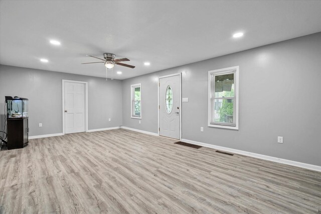 752 N 9th Ave, Kankakee, IL 60901 - unfurnished living room featuring recessed lighting, ceiling fan, light wood-style floors, and baseboards