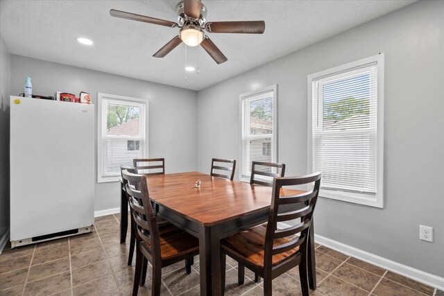 752 N 9th Ave, Kankakee, IL 60901 - tiled dining room with ceiling fan, baseboards, and recessed lighting