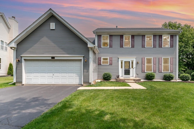 3518 Matisse Dr, Saint Charles, IL 60175 - colonial house with driveway, a front lawn, and an attached garage