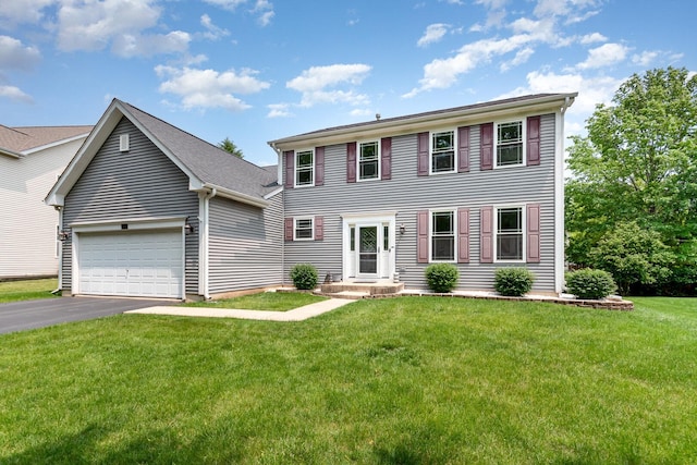 3518 Matisse Dr, Saint Charles, IL 60175 - colonial house featuring driveway, a front yard, and a garage